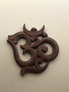Om carved in wood